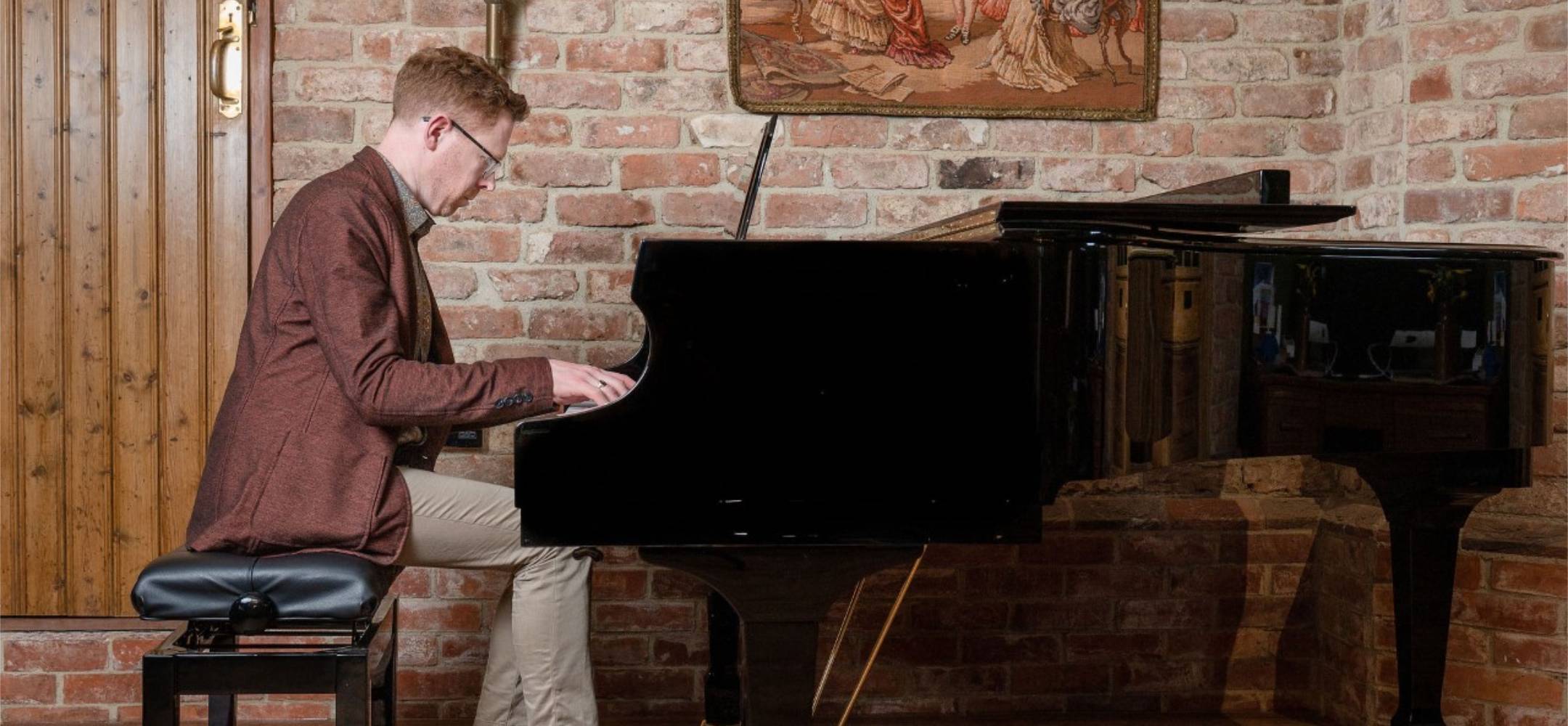 Jonathan Delbridge Playing Piano