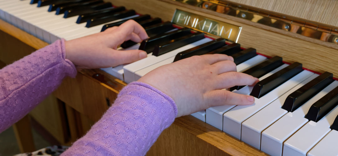 Lucinda piano hands close-up