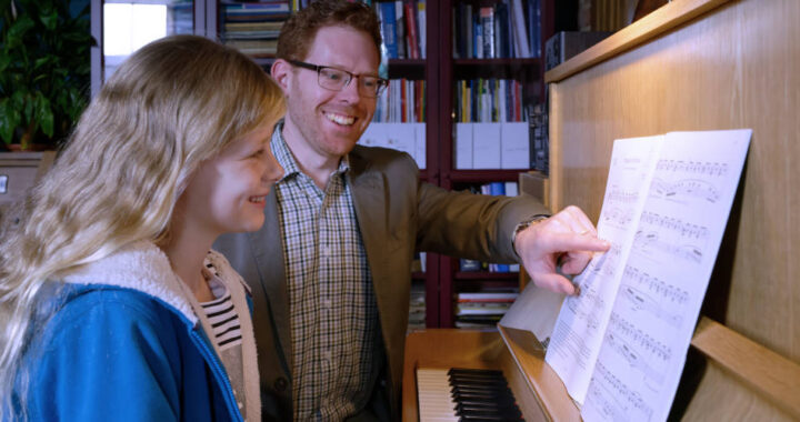 Madeleine having piano lesson